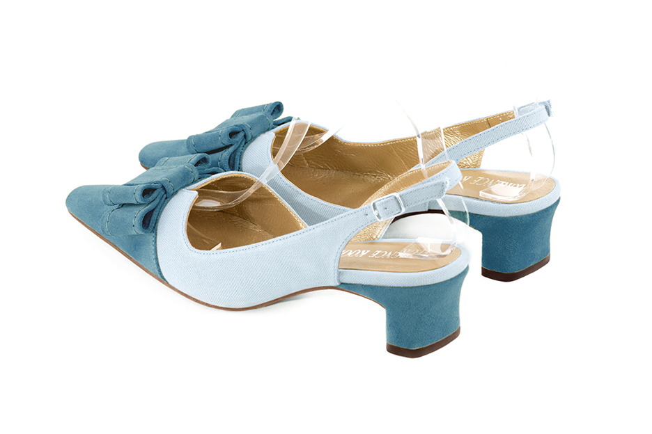 French elegance and refinement for these peacock blue dress slingback shoes, with a knot, 
                available in many subtle leather and colour combinations. The pretty French spirit of this beautiful pump will accompany your steps nicely and comfortably.
To be personalized or not, with your materials and colors.  
                Matching clutches for parties, ceremonies and weddings.   
                You can customize these shoes to perfectly match your tastes or needs, and have a unique model.  
                Choice of leathers, colours, knots and heels. 
                Wide range of materials and shades carefully chosen.  
                Rich collection of flat, low, mid and high heels.  
                Small and large shoe sizes - Florence KOOIJMAN